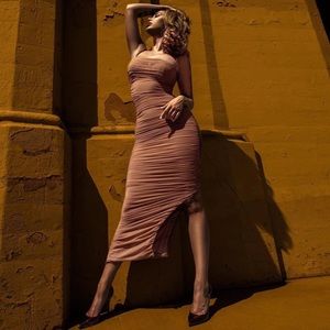 Long Elegant dress with a slit on the side.